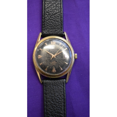 227 - Exactus, Men's Wrist Watch. Vintage 1950's-60's. Automatic mechanism. Black dial, gold hands. Case i... 