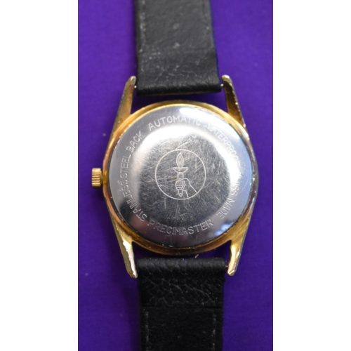 227 - Exactus, Men's Wrist Watch. Vintage 1950's-60's. Automatic mechanism. Black dial, gold hands. Case i... 