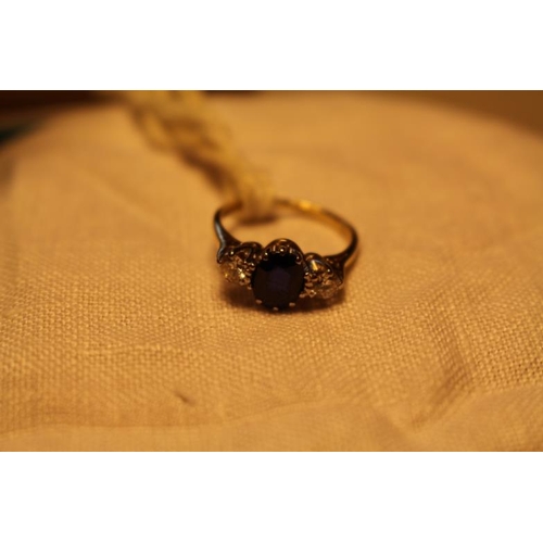 212 - 18 Carat Sapphire and Diamond Ring, centre Stone Sapphire with Diamond Shoulders