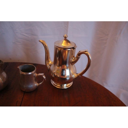 121 - Eight pieces of Hotel quality Silver Plate comprising of Tea and a Coffee Pot, Jug and a Creamer, Su... 