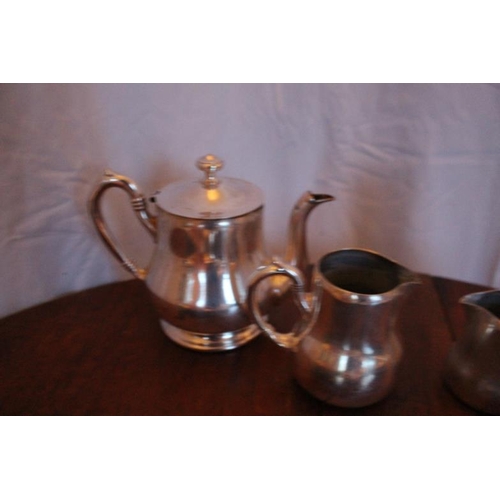 121 - Eight pieces of Hotel quality Silver Plate comprising of Tea and a Coffee Pot, Jug and a Creamer, Su... 