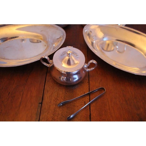 121 - Eight pieces of Hotel quality Silver Plate comprising of Tea and a Coffee Pot, Jug and a Creamer, Su... 