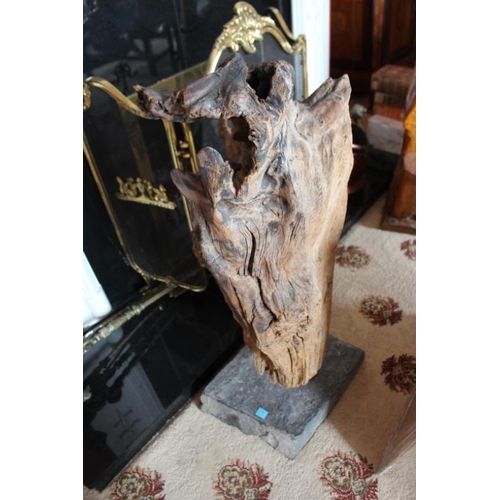 138 - Bog Oak Sculpture on a Granite Base, Signature on Base.   -     Height is 87cm.