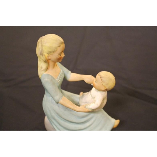 164 - Goebel Porcelain Figure of a Young Girl with a Baby (16cm Tall)