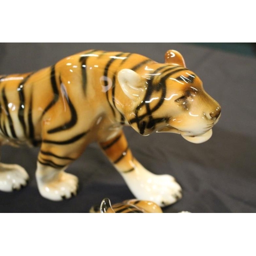 165 - Royal Dux Porcelain Figure of a Tiger together with an assicated Tiger Cub Figure (39cm long)