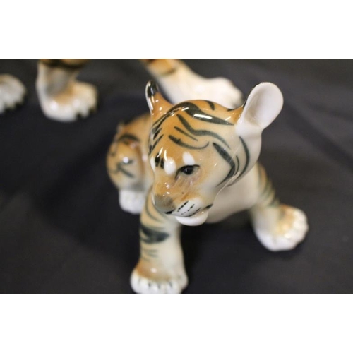 165 - Royal Dux Porcelain Figure of a Tiger together with an assicated Tiger Cub Figure (39cm long)