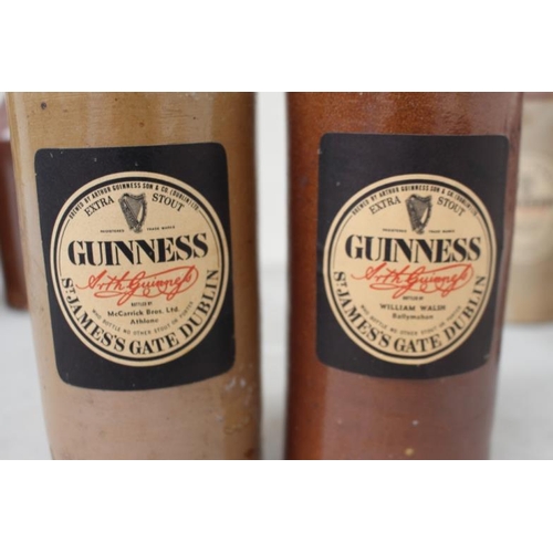 26 - 7 Various Ironstone Bottles including Guinness Example (Tallest 28cm)