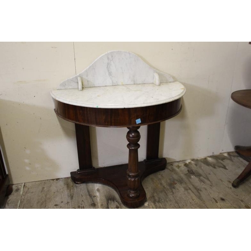 104 - Victorian Mahogany Marble Top Washstand of Semi Circular form with a Gallery back on a shaped base (... 