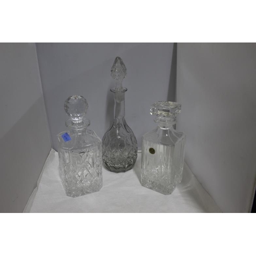 44 - Three Cut Glass Decanters