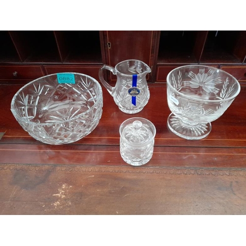 882 - Tipperary Cut Glass Cream Jug, Cut Glass Fruit Bowl, Bon Bon Dish and a Honey Pot