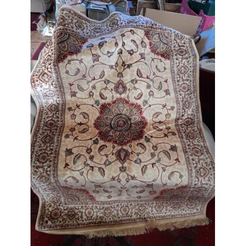 884 - Kashmir Ivory Ground Medallion Design Rug produced on a power loom (170cm x 120cm)