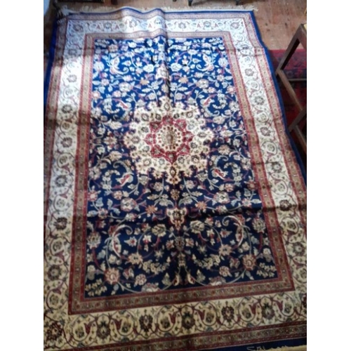 886 - Kashmir Blue and Ivory Ground all over Floral pattern Rug produced on a power loom (220cm x 140cm)