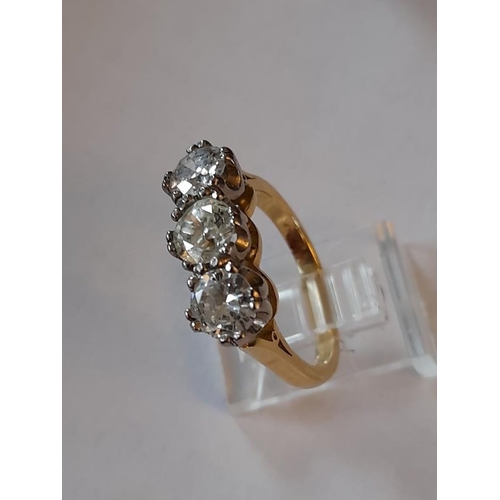 812 - 18 Carat Yellow Gold Three Stone Diamond 3 carats Ring claw set in this timeless design. Diamond Col... 