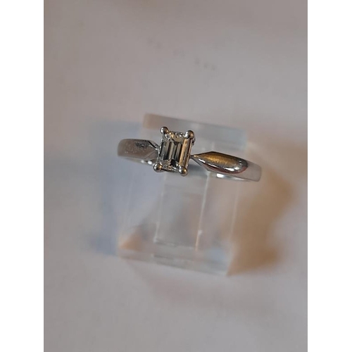 813 - Platinum Emerald cut Solitaire Ring. The Emerald cut stone is F colour and clarity VS2. Simply outst... 