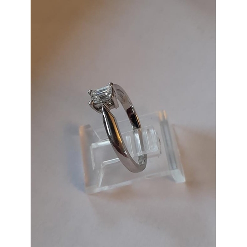 813 - Platinum Emerald cut Solitaire Ring. The Emerald cut stone is F colour and clarity VS2. Simply outst... 