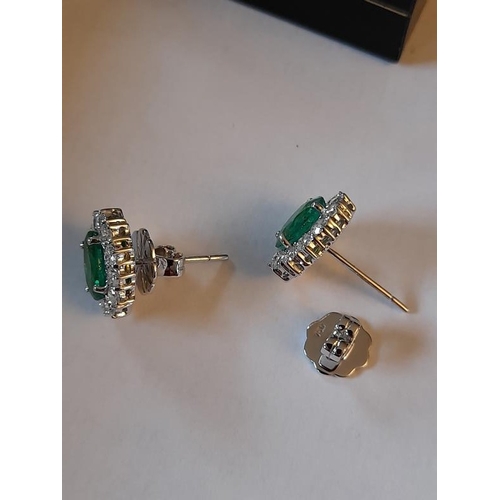 815 - 18 Carat White Gold Natural Columbian Emerald 3.15 Carats and Diamond 1.45 Carats Cluster Earrings. ... 