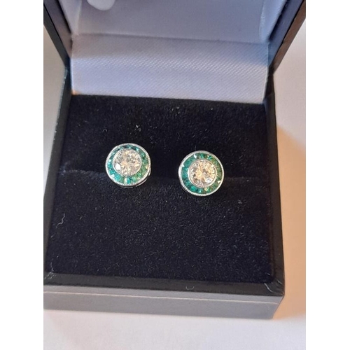 817 - 18 Carat White Gold Emerald and Diamond Art Deco Target Earrings. Centre Diamonds weight .95 Carats ... 