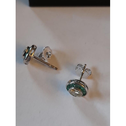 817 - 18 Carat White Gold Emerald and Diamond Art Deco Target Earrings. Centre Diamonds weight .95 Carats ... 