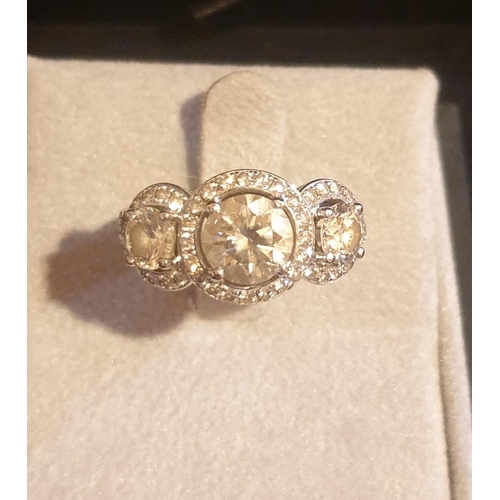 596 - 18 carat White Gold 3 Stone Diamond Ring (approx 3 carats of Diamonds)  Size O