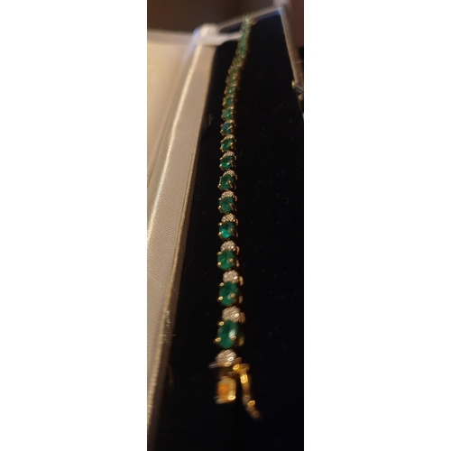 718 - 14 Carat Emerald and Diamond Bracelet