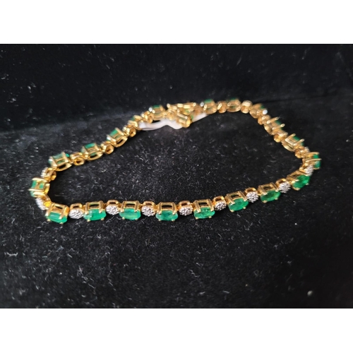 718 - 14 Carat Emerald and Diamond Bracelet