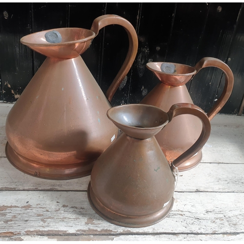 502 - Three Vintage Copper Measures