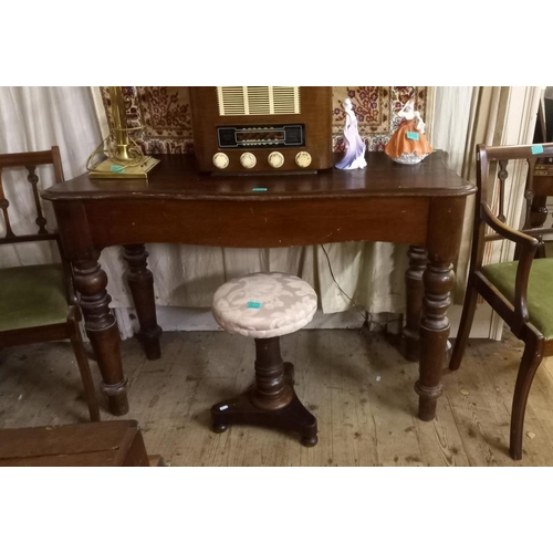 11 - Victorian Oak Side or Hall Table of Serpentine Form on turned legs (103cm Wide)