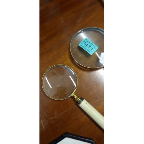 431 - Two Magnifying Glasses (one with small chip)