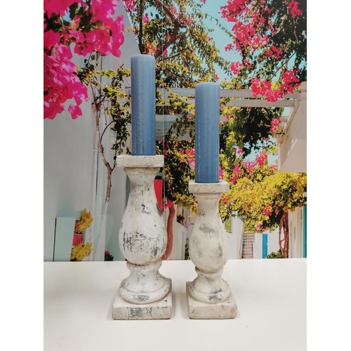 717 - Pair of Stone effect Baluster Candle Holders (one Large / one Small)