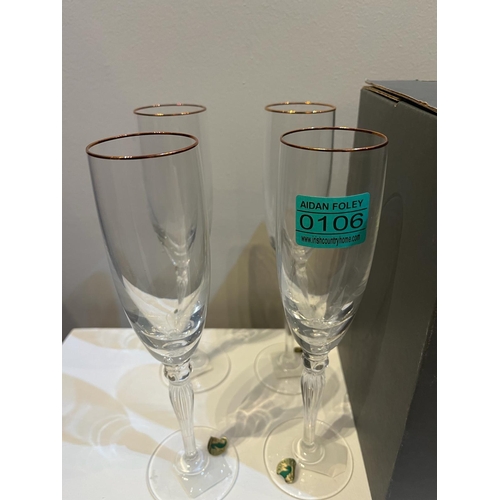 106 - Waterford Crystal Set of Four Crystal Champagne Flutes with Gilded Rim (7 cm W x 23 cm H)