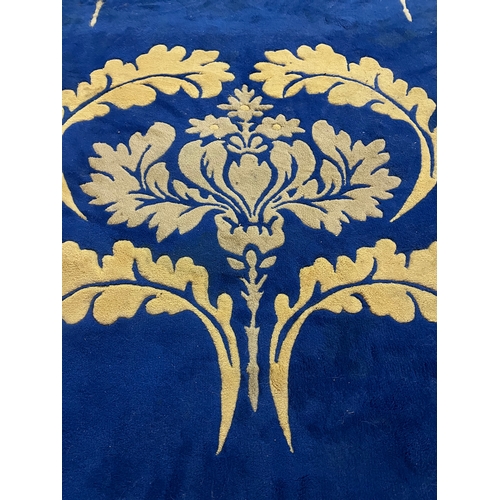 56 - Blue and Gold Centre Rug with Classical Design (410 cm W x 245 cm H)