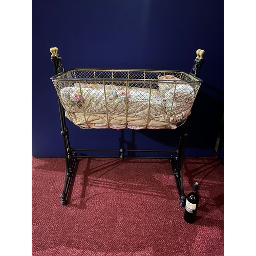 61 - Victorian Style Iron and Brass Rocking Cot on Decorative Base (95 cm W x 105 cm H x 48 cm D)