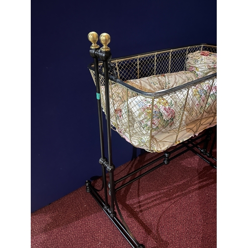 61 - Victorian Style Iron and Brass Rocking Cot on Decorative Base (95 cm W x 105 cm H x 48 cm D)