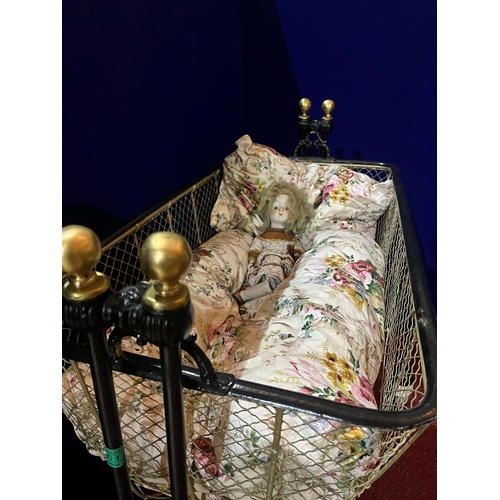 61 - Victorian Style Iron and Brass Rocking Cot on Decorative Base (95 cm W x 105 cm H x 48 cm D)