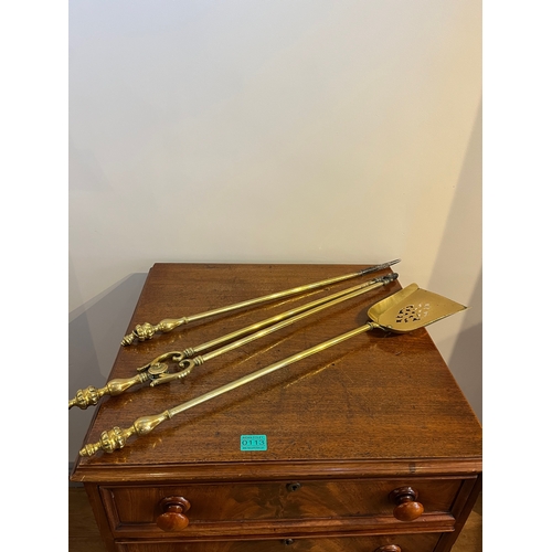 114 - Victorian brass coal helmet & a set of brass fire irons