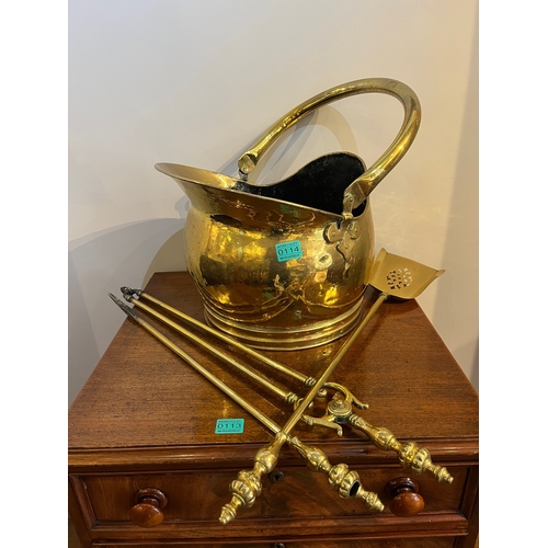 114 - Victorian brass coal helmet & a set of brass fire irons