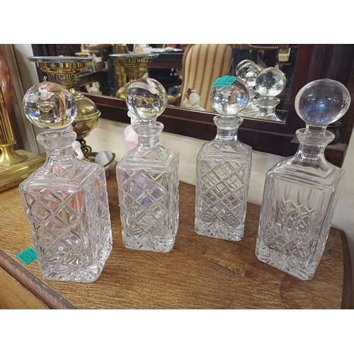 28 - Four Cut Glass Decanters
