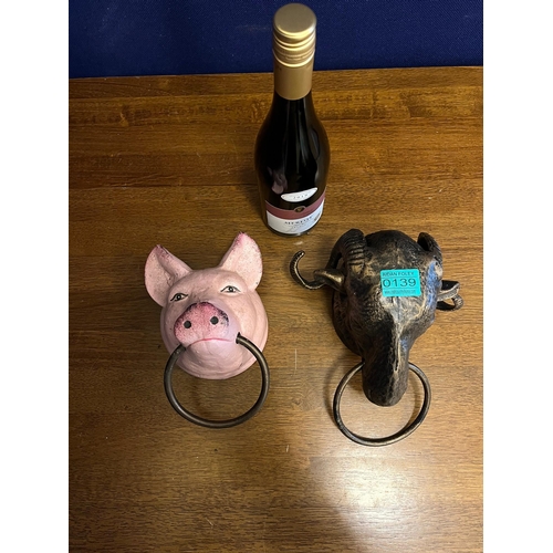 139 - Two Door Knockers in the Form of a Rams Head and a Pig