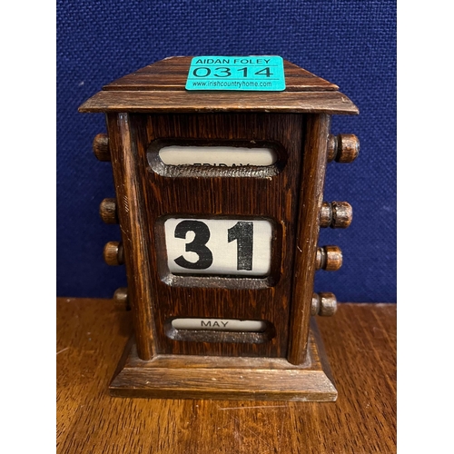 314 - Leather Leg of Mutton Gun Case and an Oak Desk Calendar