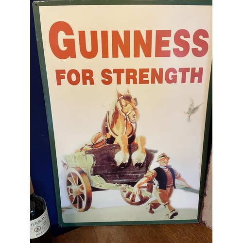 369 - Two Vintage Style Guinness Tin Signs (50 cm W x 70 cm H)