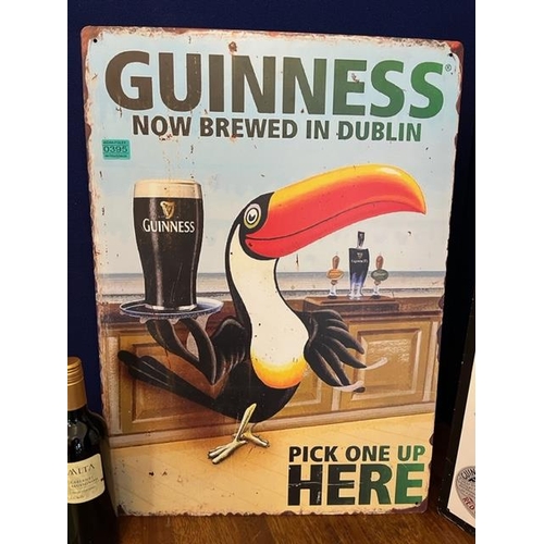 395 - Two Metal Vintage Style Guinness Advertisements (50 cm W x 70 cm H)