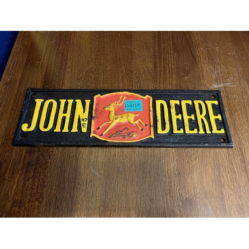 407 - Golden Fleece Metal Wall Plate and a John Deere Metal Wall Plate (Tallest 52 cm H)