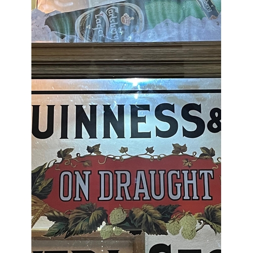 473 - Guinness and Carlsberg Advertising Mirrors (84 cm W x 57 cm H)