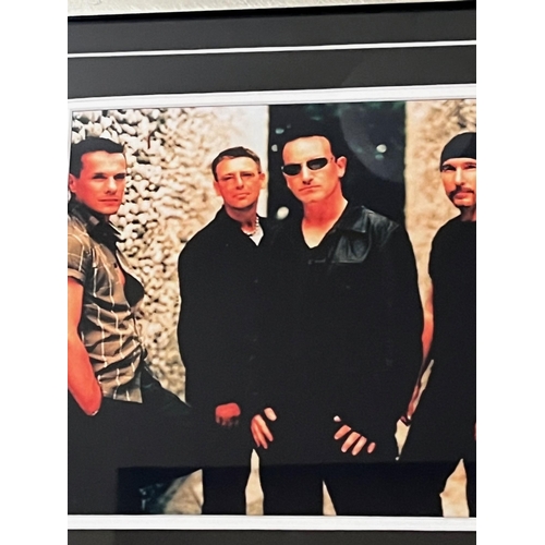 704 - Electrical Storm by U2 Signed CD, Framed (40 cm W x 50 cm H)