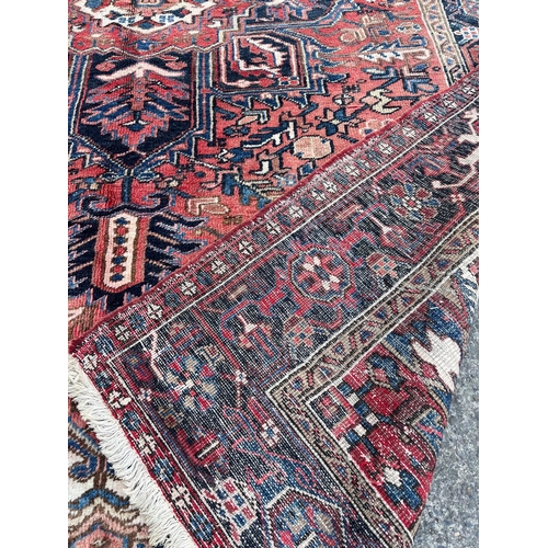 719 - Heriz Persian Rug (320 cm W x 226 cm H)