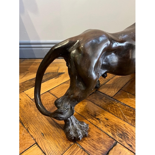 726 - Bronze Figure of a Fighting Lion (60 cm W x 25 cm H)