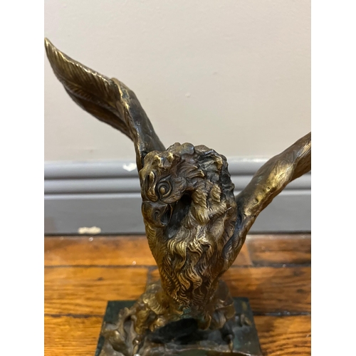 734 - Bronze Figure of an Eagle with Prey (28 cm W x 27 cm H)