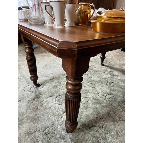 55 - Edwardian Walnut Canted Corner Dining Table with Extra Leaf Standing on Ceramic Casters (150 cm W x ... 