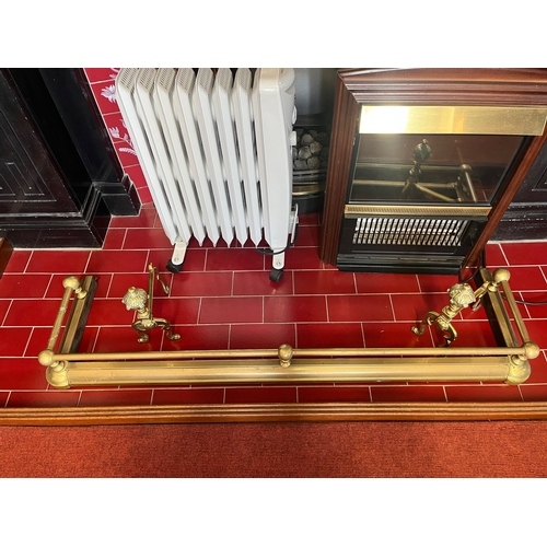 267 - Edwardian Brass fender and a Pair of Brass Fire Dogs (Fender 134 cm W x 36 cm H)