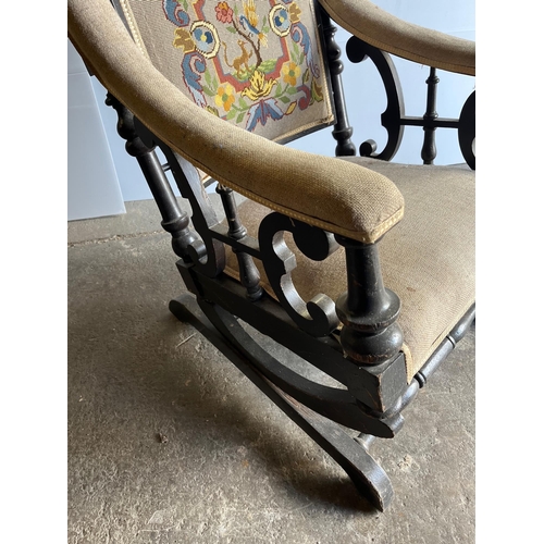 392 - Aesthetic Ebonized Rocking Chair with Lions Head (64 cm W x 110 cm H x 74 cm D)